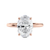 Laboratory grown oval diamond engagement ring rose gold slim band front view.