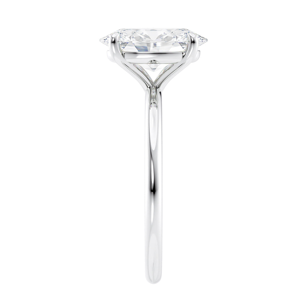 Laboratory grown oval diamond engagement ring slim band end view.