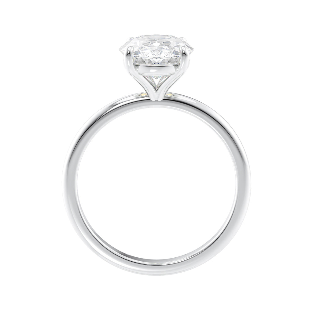 Laboratory grown oval diamond engagement ring slim band side view.