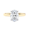 Oval diamond solitaire engagement ring 18 carat gold front view.