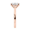 Oval diamond solitaire engagement ring 18 carat rose gold end view.