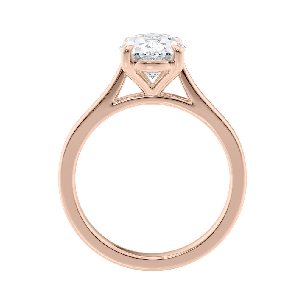 Oval diamond solitaire engagement ring 18 carat rose gold side view.