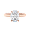Oval diamond solitaire engagement ring 18 carat rose gold front view.