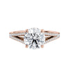 Round brilliant cut diamond engagement ring with diamond set split band rose gold front view.