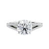 Round brilliant cut diamond engagement ring with diamond set split band 18ct white gold front view.