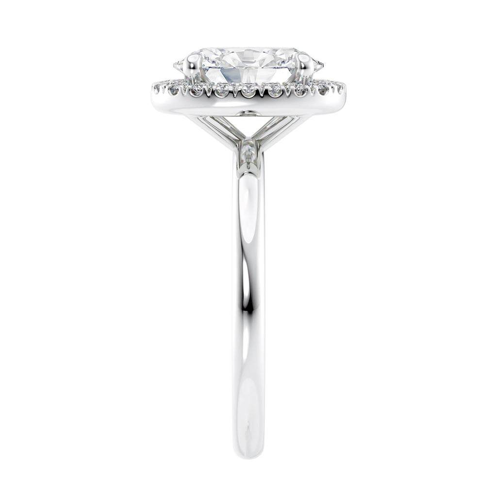 Oval halo diamond engagement ring in white gold end view.