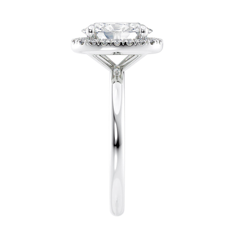 Oval halo diamond engagement ring in white gold end view.