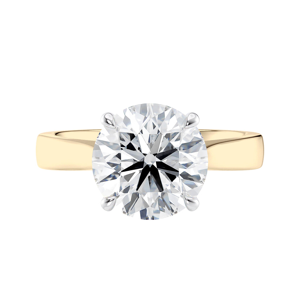 Laboratory grown round diamond solitaire engagement ring with wide gold band front view.