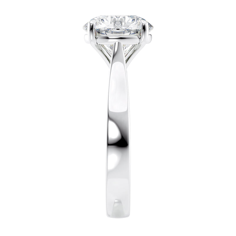 Laboratory grown round diamond solitaire engagement ring with wide white gold band end view.