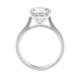 Laboratory grown round diamond solitaire engagement ring with wide white gold band side view.