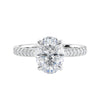 Oval diamond engagement ring with diamond band