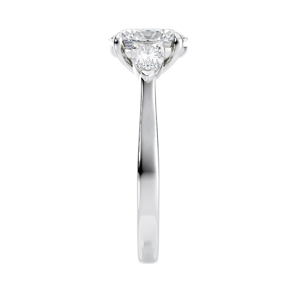 White gold oval and pear cut ring